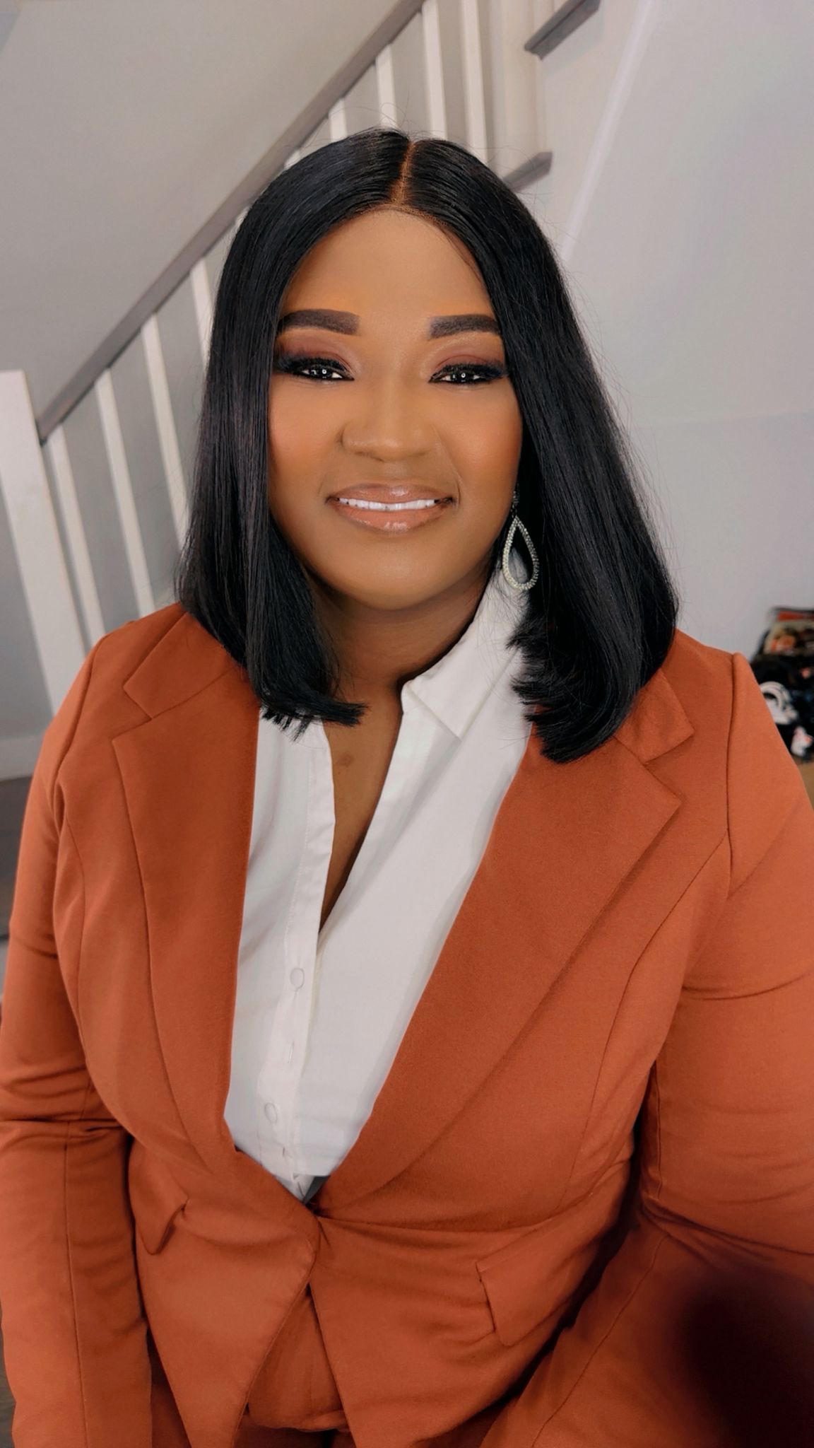 Businesswoman in burnt-orange blazer